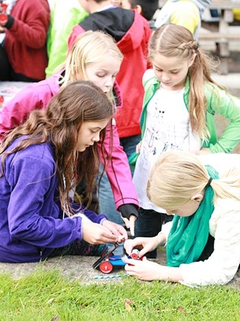 group-of-students-building-solar-car